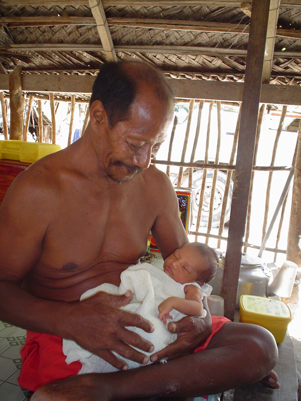 South Pacific grandpa with baby